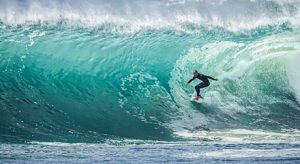 domination mondiale surfer sur la vague